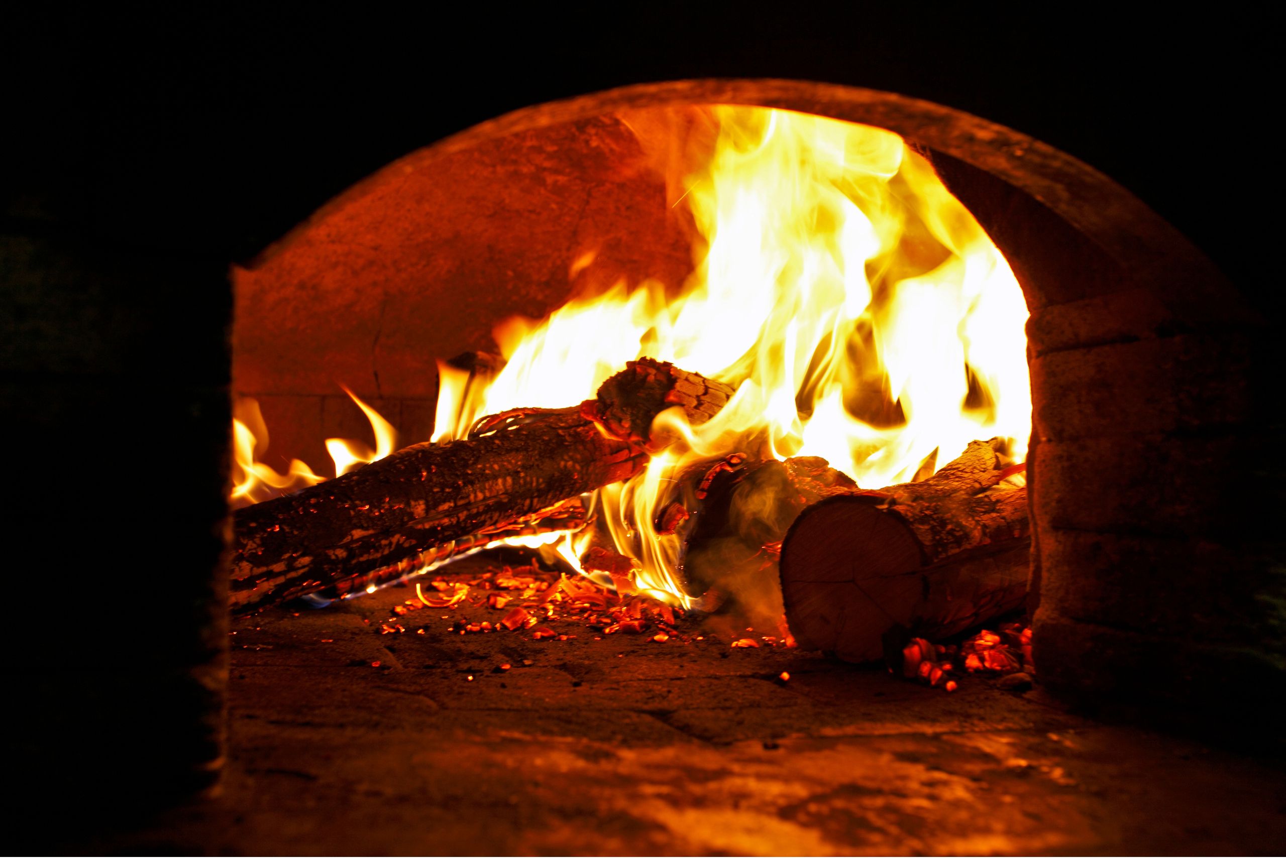 wooden pizza oven fire