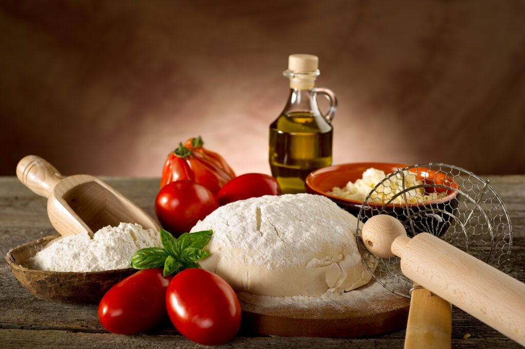 Dough and ingredients for  pizza