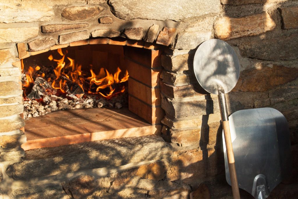 Fire Bricks for Pizza Oven and pizza peel on the side