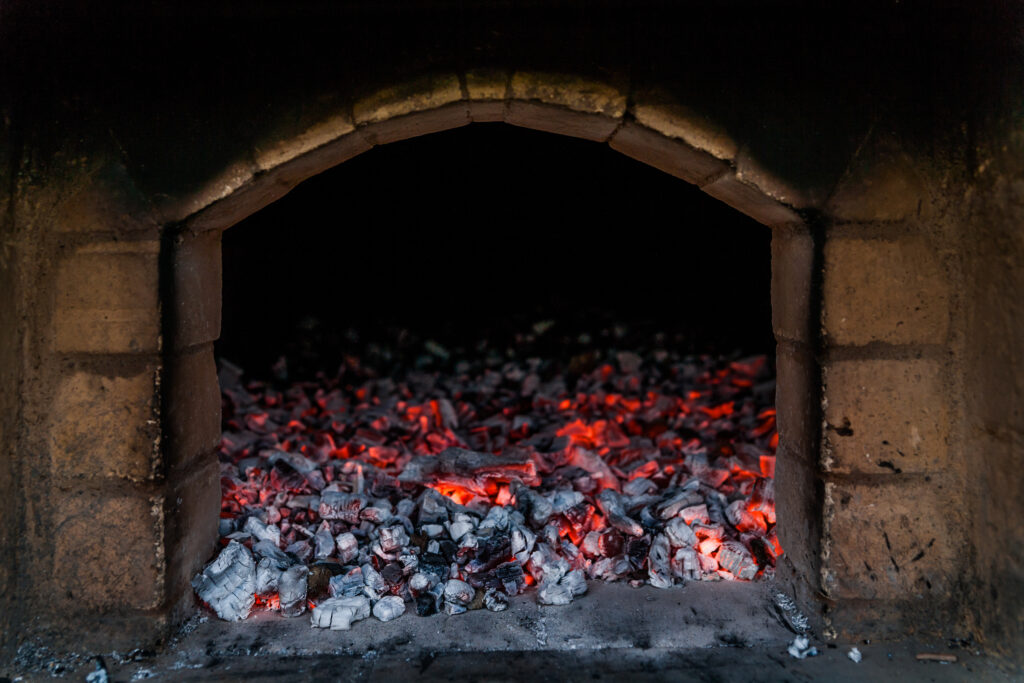 Heating a oven using charcoal or wood 