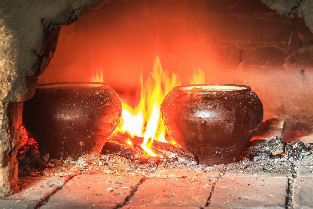firing pottery in a pizza oven 